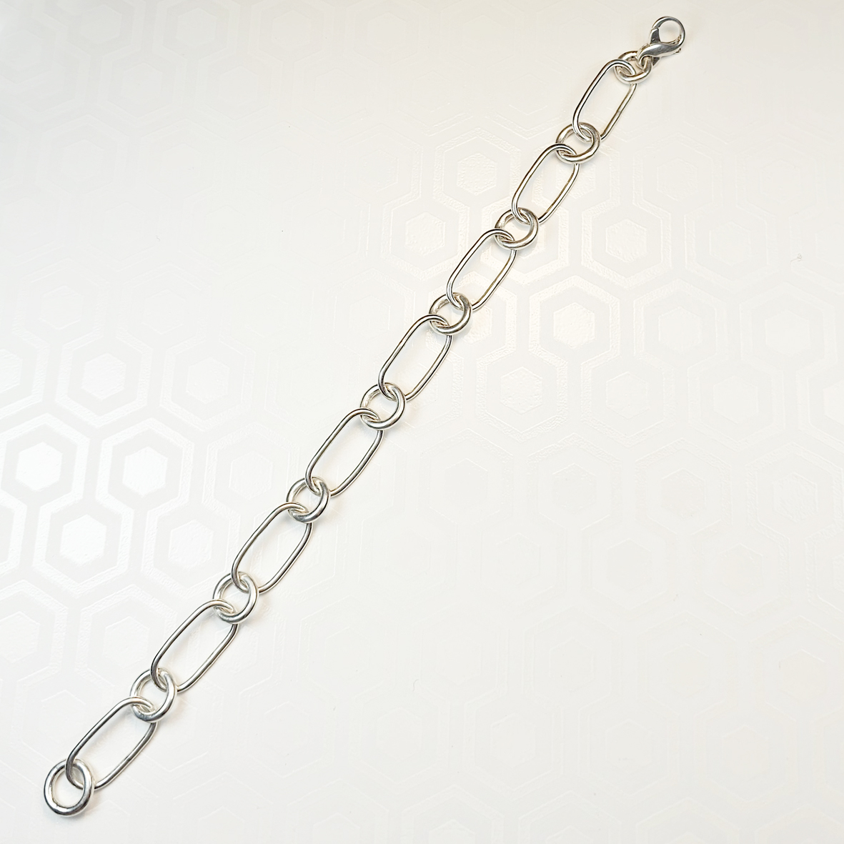 Pulseira com elos ovais e redondos em prata