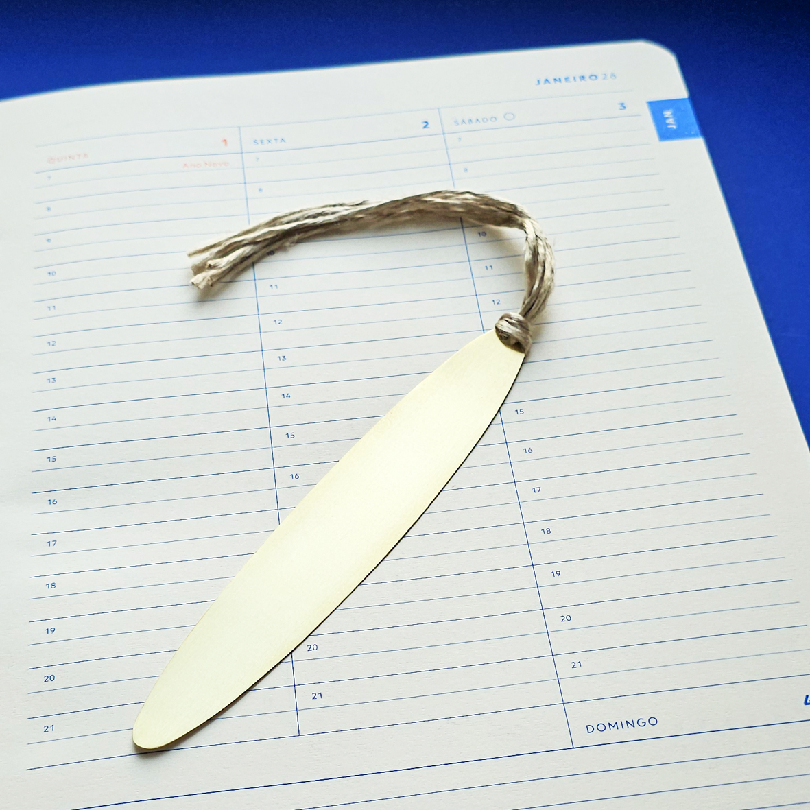 Marcador de livro Elipse em latão e seda